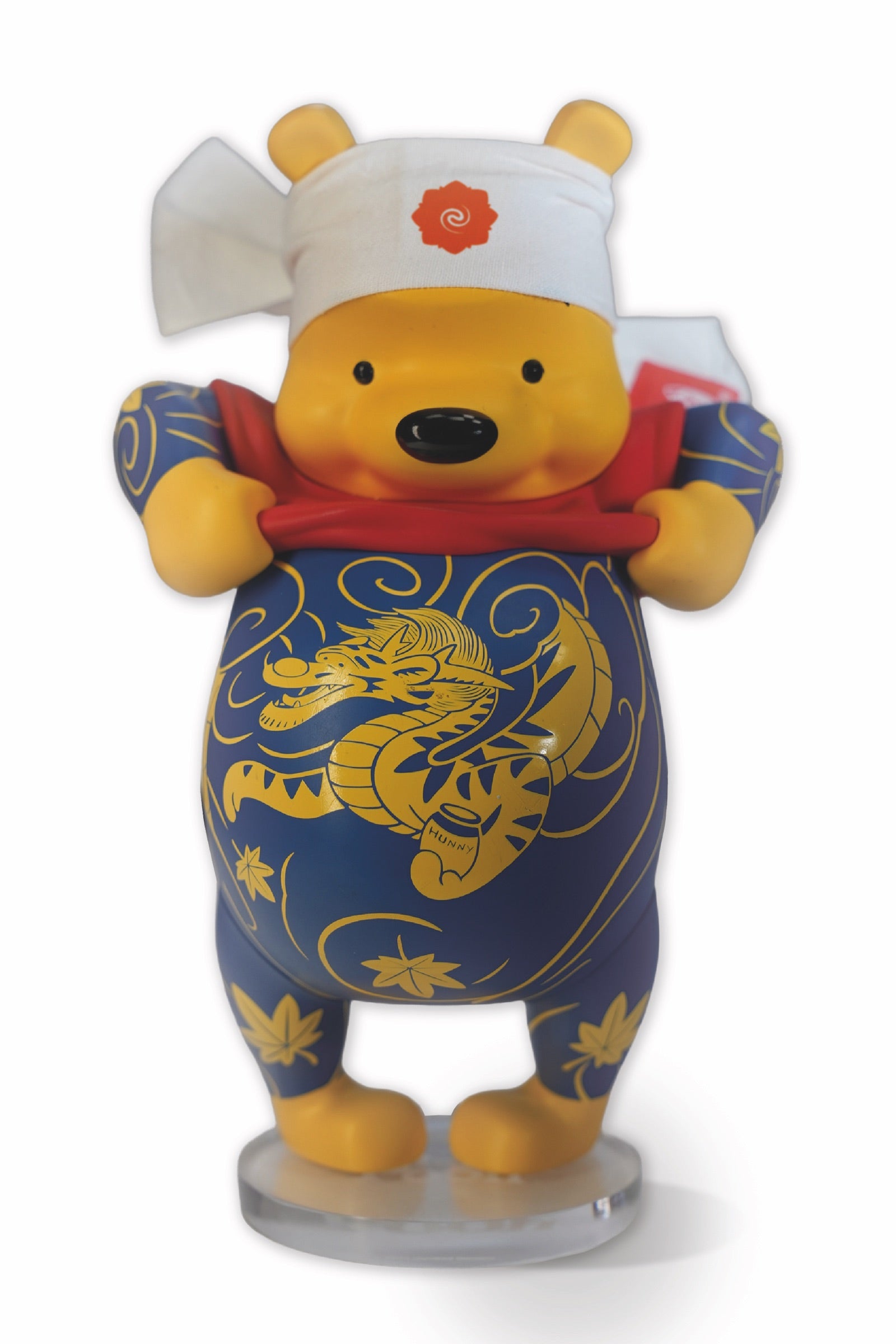 Tatpooh Shokunin vinyl figure by Jee Sayalero, front view on white with hachimaki and clear acrylic base, 23 cm